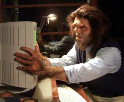 Image result for Caveman on a computer images